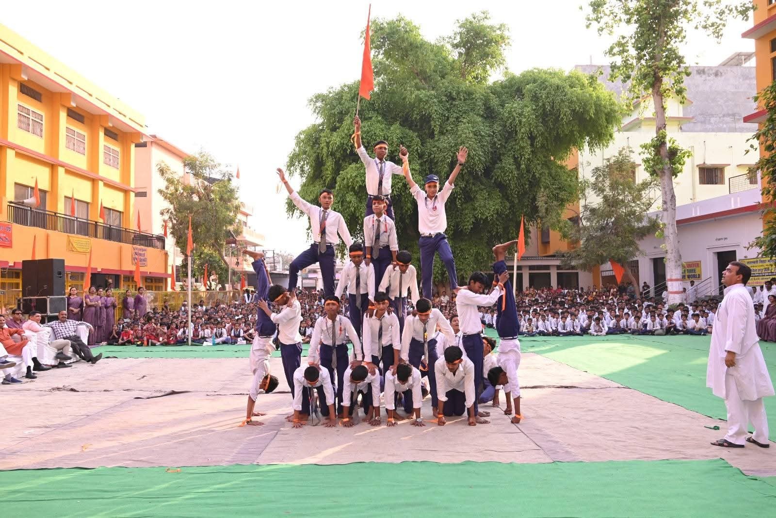 Students performing a human pyramid formation